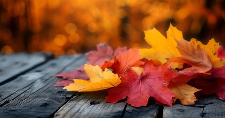 Naklejka na ściany i meble Vibrant Fall Leaves Adorn a Rustic Wooden Table Setting