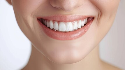 Perfect healthy teeth smile of a woman isolated on a white background.