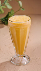 Tasty banana smoothie or milkshake