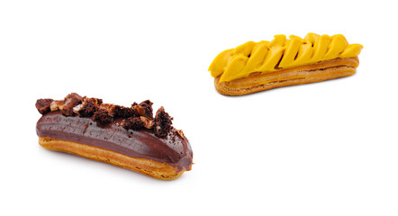 Eclair with mango and Chocolate Cream and Hazelnuts on White Plate