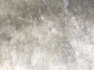 clean gray cement wall with natural rough white pattern on it, using for the background