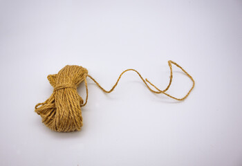 Brown burlap rope ,string cord isolated on white background. 