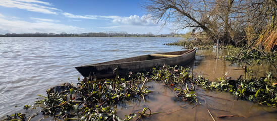 Old traditional wood boat on the lake in Fermentelos, Águeda - Portugal - 745034629