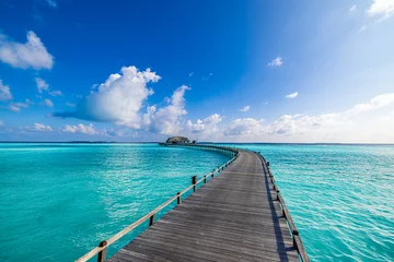 Fotobehang Amazing sea bay relax sky exotic coastal landscape Maldives beach. Tropical azure blue seascape, luxury water villa resort wooden pathway jetty. Stunning travel destination summer vacation tourism © icemanphotos