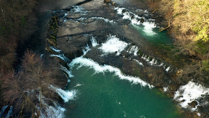 Aerial view of magic river with rapids.