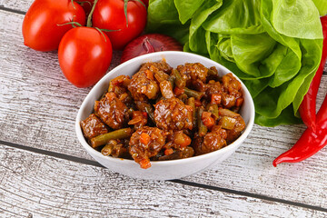 Meatball with vegetables and spices