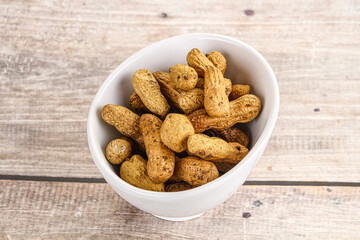 Raw ripe unpeeled peanut heap