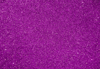 Purple blurred background with sparkles for text.