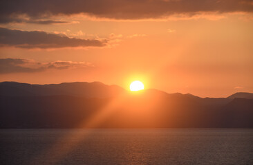 the sun sets behind the mountains in winter in Cyprus 10