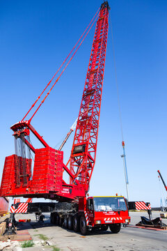 Constanta, Romania - 08.04.2022: A large Liebherr truck crane standing on the territory of the seaport.