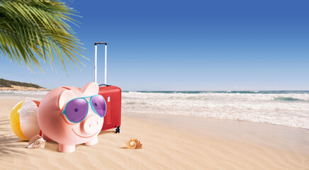 Happy piggy bank on the beach: cheap summer vacations