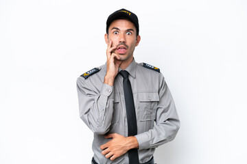 Young safeguard man over isolated white background surprised and shocked while looking right
