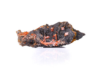 Crocoite photography isolated on white blackground. from Adelaïde, dundas, tasmania, Australia. macro detail  background. close-up Rough raw unpolished semi-precious gemstone.
