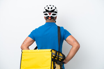 Young caucasian man with thermal backpack isolated on white background in back position