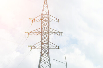 High voltage towers with sky background. Power line support with wires for electricity...