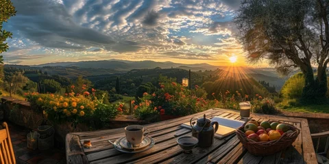 Abwaschbare Fototapete a magnificent sunset over the Tuscan countryside from a rustic terrace, this scene evokes peace and freedom, blending the beauty of the landscape with the serene atmosphere of Italy. Ai generated © The Strange Binder