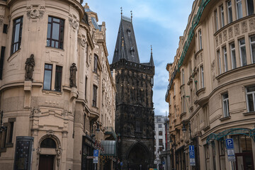Fototapeta na wymiar Gothic gunpowder towers visible through gaps in the city.