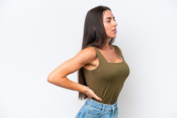 Young caucasian woman isolated on white background suffering from backache for having made an effort