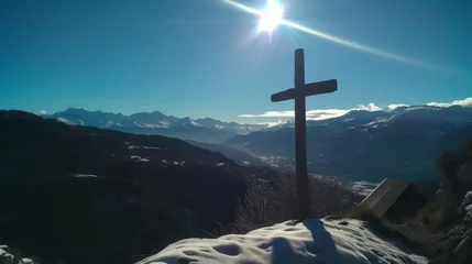 Foto op Canvas The cross on the mountain. Christian cross in the glow of the sun, mountain landscape above the clouds. The cross on the hill © Aleksey