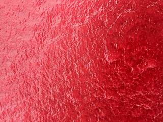 Ice red background. Red ice. Abstract ice texture. Natural background.