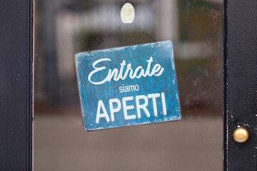 Italian open sign in a window