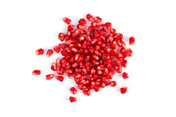 Heap of pomegranate seeds on white background.