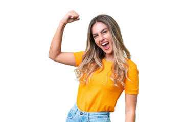 Young Uruguayan woman over isolated background celebrating a victory