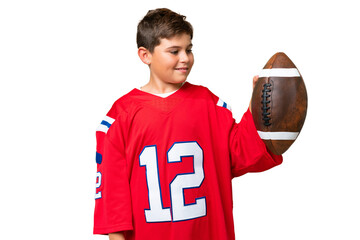 Little caucasian kid playing rugby over isolated chroma key background with happy expression