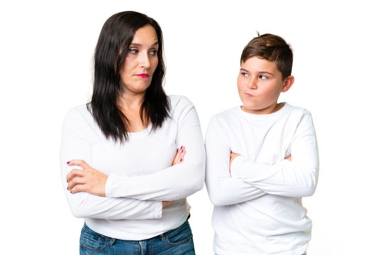 Little caucasian kid over isolated chroma key background annoyed angry in furious gesture