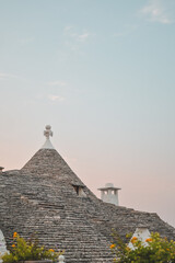 Fototapeta na wymiar Alberobello, White Roofs of Puglia: Trulli of Alberobello in Puglia, Italy - Trullo