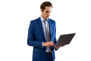 Concentrated businessman in blue suit using laptop, white background, technology and business concept