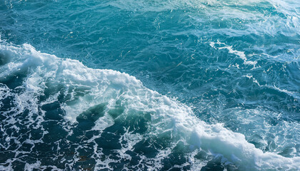 Background shot of aqua sea water surface with foam and copy space