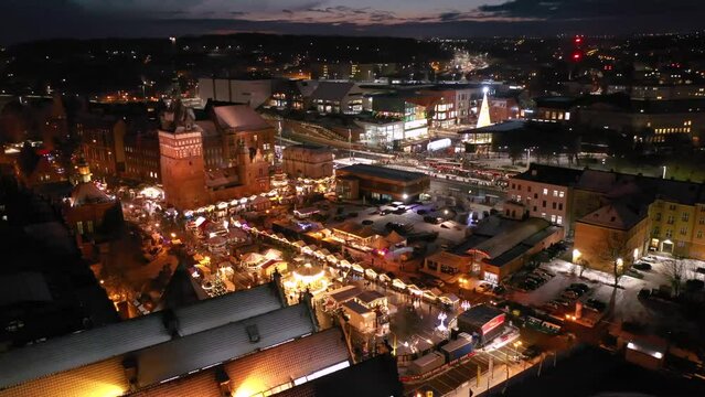 Beautifully lit Christmas market in the Main City of Gdansk at dawn. Poland