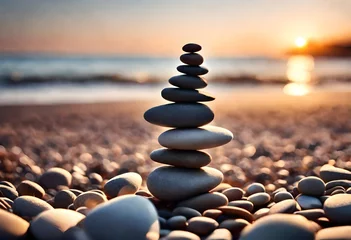 Fotobehang stack of stones on beach © Jaweria