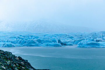 glacier view in Iceland. Panoramic view of glacier lagoon and glacier wall, Vatnajoekull Glacier, Iceland, Europe