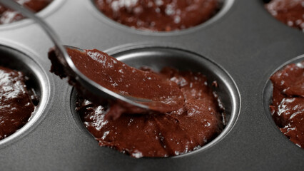 Cooking chocolate cakes, close up