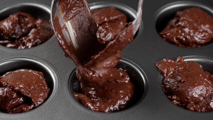 Cooking chocolate cakes, close up