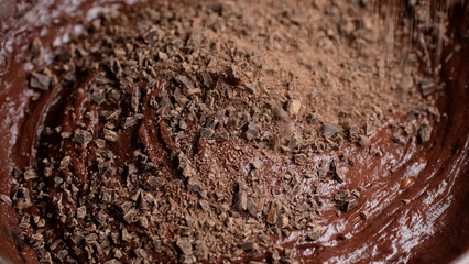 chopped chocolate in chocolate dough before cooking dessert