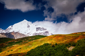 An incredible view of the snow-capped peak of the Main Caucasus Range. Upper Svaneti region, Georgia.