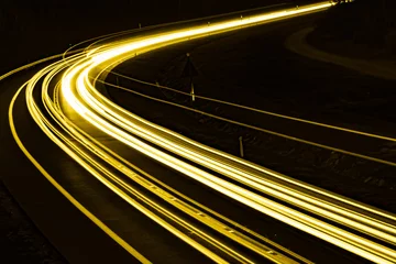 Photo sur Aluminium Autoroute dans la nuit yellow car lights at night. long exposure