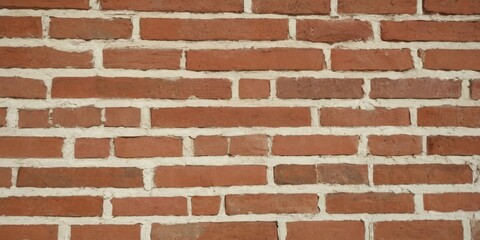 Fototapeta premium Brick wall texture with white shabby stucco, plaster. Red and white brick wall background