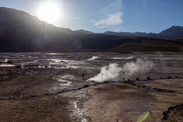 Tatio Geysers in San Pedro de Atacama, Chile, South America. Dramatic volcanic hot springs with rising water and steam