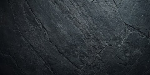 Grunge dark grey stone wall texture background