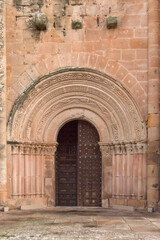 Romanesque entrance with archivolts of the cathedral of Santa Maria de Siguenza, province of Guadalajara. Spain