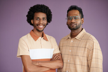 Studio portrait of cheerful confident coworkers