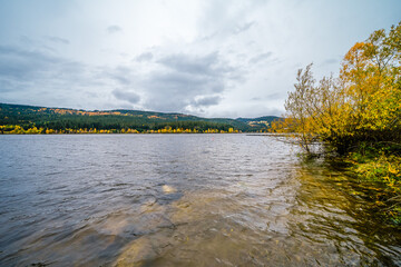 View of the Schluchsee in the Black Forest with the surrounding landscape. Nature by the lake in...