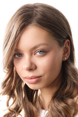 Obraz premium Beautiful young girl with fresh healthy skin. Woman advertise ear-rings. White background. Earrings closeup. Blond european woman with long hair with big lips, pretty smile. Cosmetology, scincare