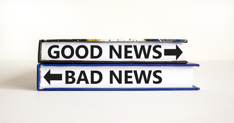 Good or bad news symbol. Concept word Good news Bad news on beautiful books. Beautiful white table...