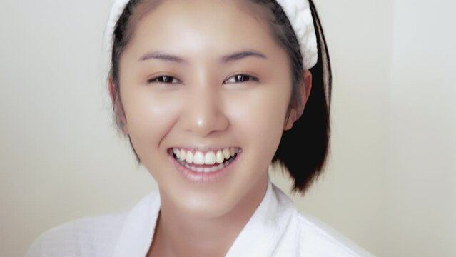 portrait of young happy woman looking in camera beautiful white smile Perfect healthy teeth smile of cute young woman Teeth whitening Dental care Stomatology concept.