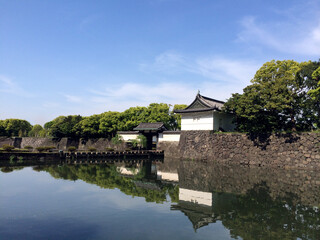Fototapeta na wymiar Images of Japan - Castle Moat Against Blue Sky